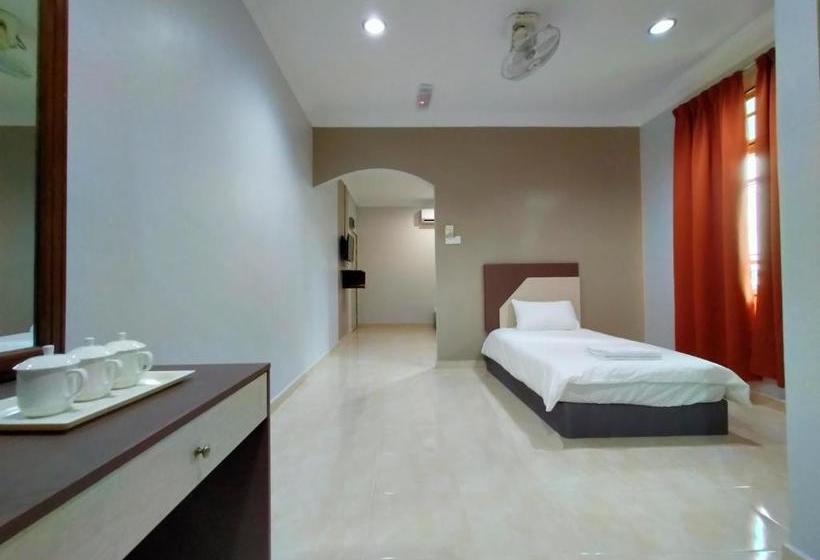 فندق Oyo 89934 Rose Village Inn 1