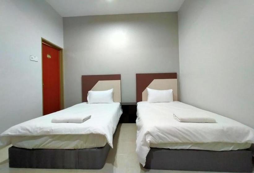 فندق Oyo 89934 Rose Village Inn 1