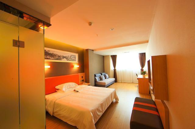 فندق 7days Premium Jingjiang Fuhai New World Bus Station