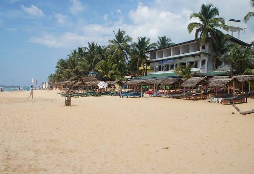 Отель Ritas & Beach Restaurant