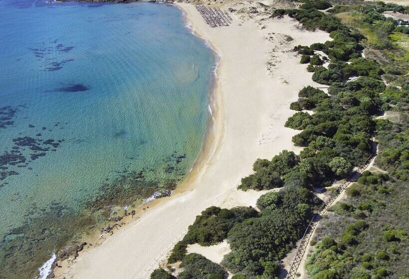 Отель Baia Di Chia Resort Sardinia, Curio Collection By Hilton
