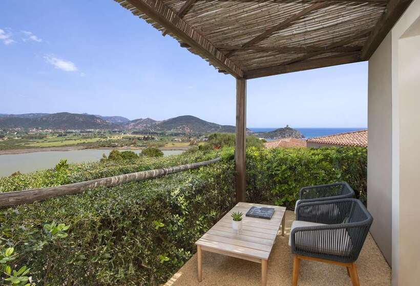 Отель Baia Di Chia Resort Sardinia, Curio Collection By Hilton