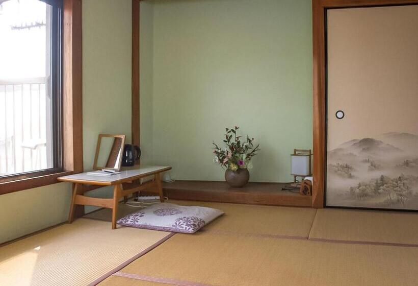 بنسيون Guest Cafe Kuchikumano