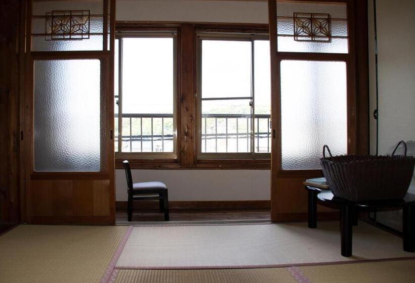 بنسيون Guest Cafe Kuchikumano