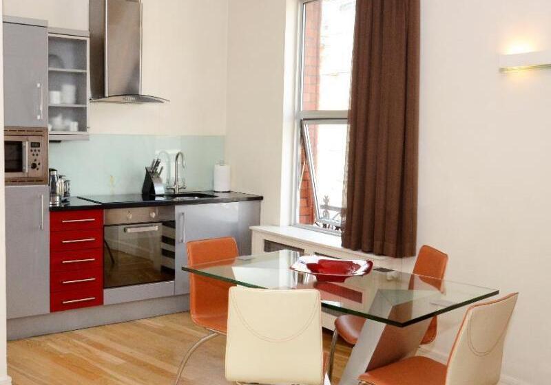 Отель The Harrington Apartments
