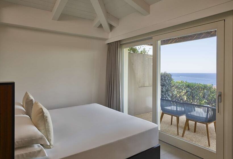 Отель Baia Di Chia Resort Sardinia, Curio Collection By Hilton