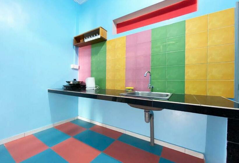 酒店 Oyo 90312 Rainbow Guesthouse