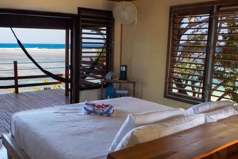 בית מלון כפרי Pelican Beach Resort South Water Caye