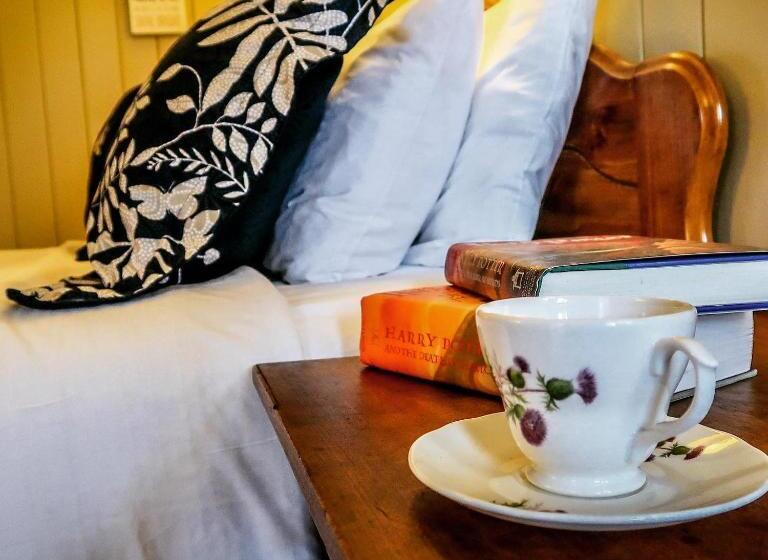 فندق صغير Mountainaire Inn And Log Cabins