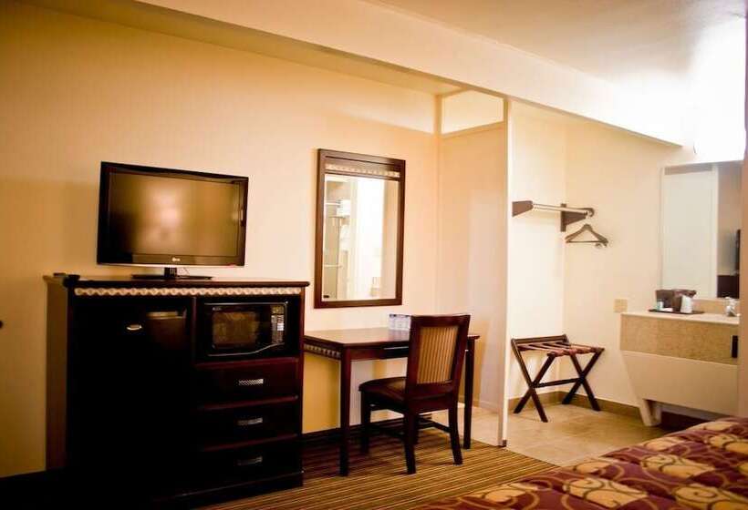 مُتل Whispering Palms Inn
