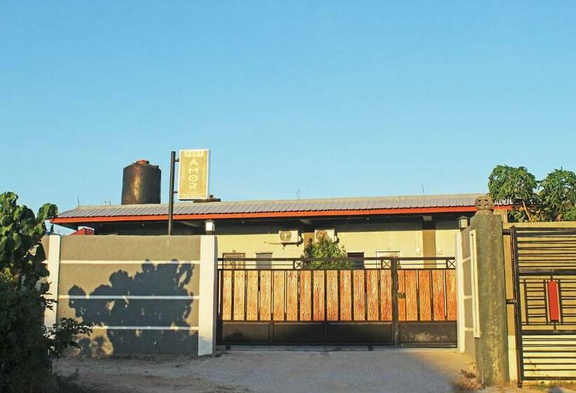 Отель Amor Homestay Near Eltari International Airport Mitra Reddoorz