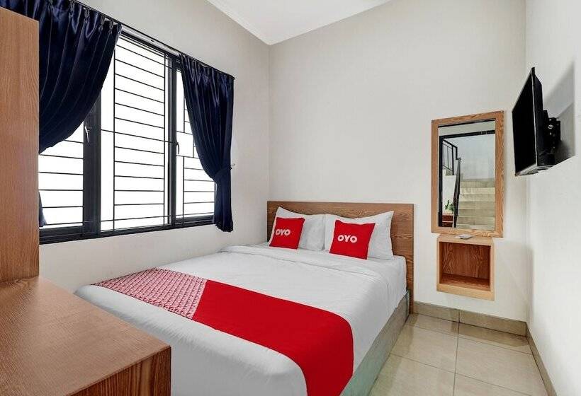 هتل Oyo 90688 Marta Residence