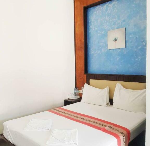 فندق صغير Palm Inn