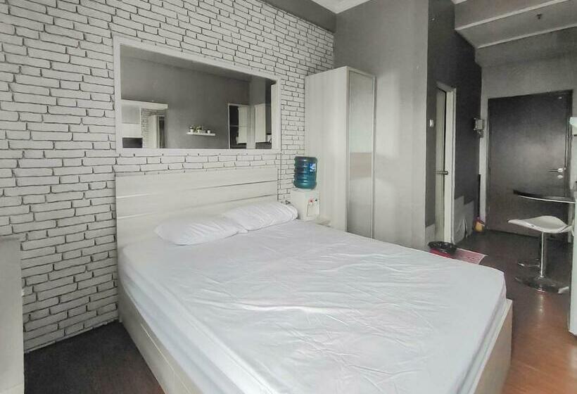 בית מלון כפרי Redliving Apartemen The Suites Metro King Property Tower C