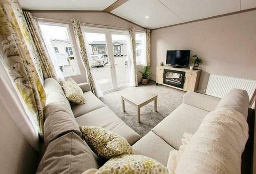 리조트 Sandgreen Caravan Park