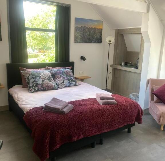 تختخواب و صبحانه De Bloesem