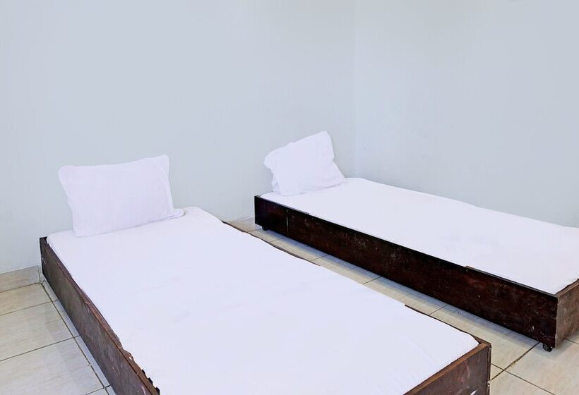 ホテル Spot On 92374 Penginapan Rusunawa