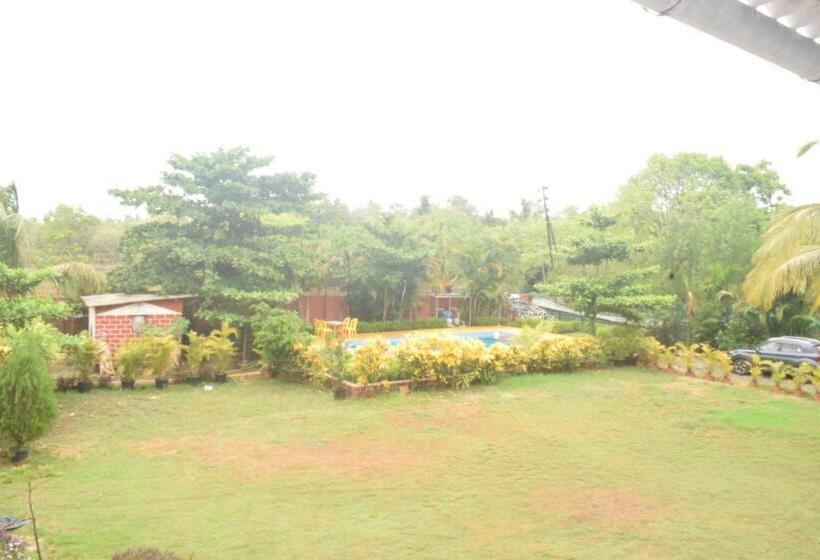 בית מלון כפרי Opulence Resort Awas Alibaug