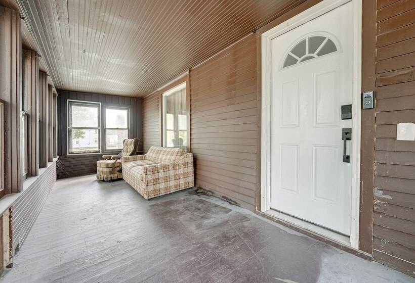 Centrally Located Albion Home With Screened Porch!