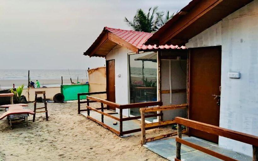 هتل Om Beach Cottages