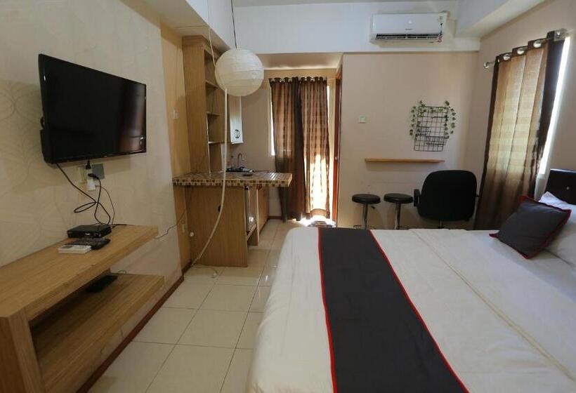 هتل Capital O 93372 Aurora Residence