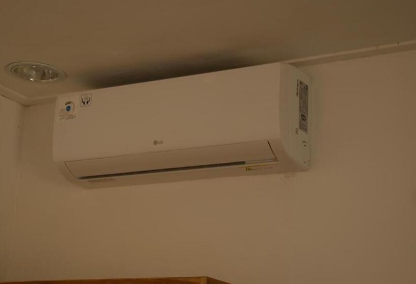 تختخواب و صبحانه Sunset Bungalow