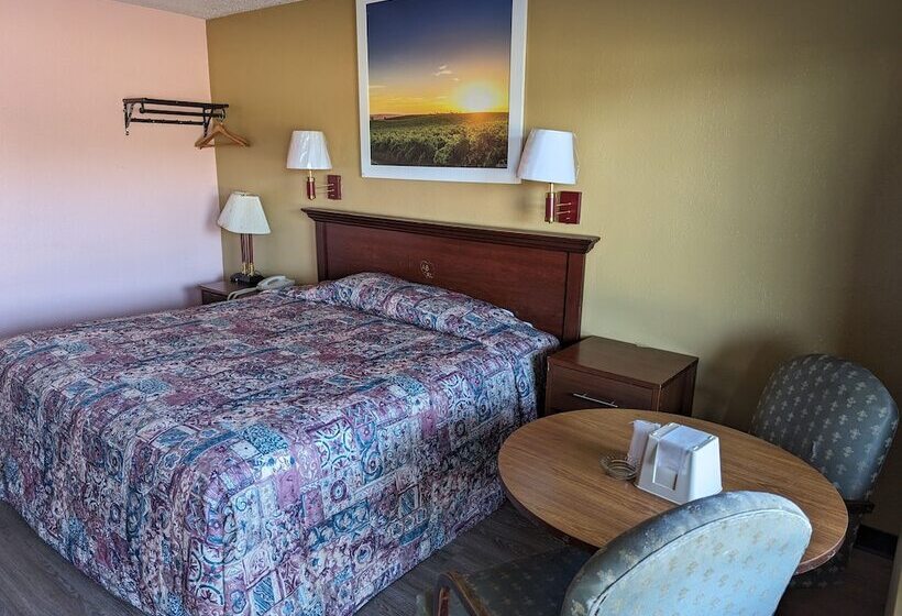 호텔 Travelers Inn