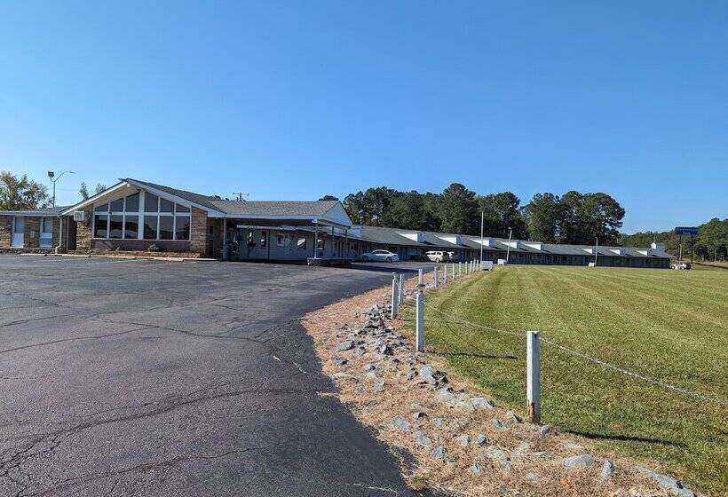 호텔 Travelers Inn