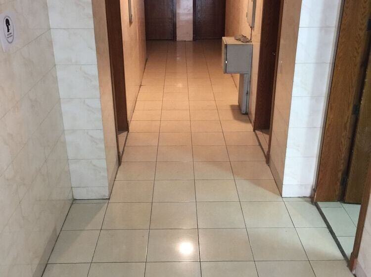 Отель Q Economic Rooms