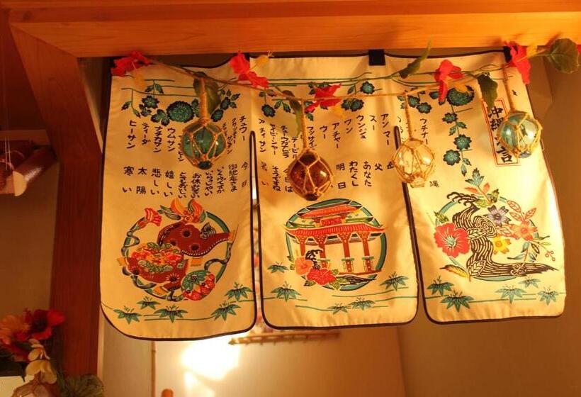 فندق صغير Okinawa Minshuku Kariyushi
