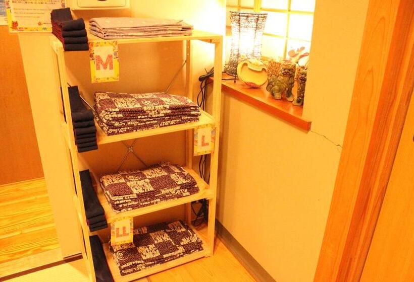 فندق صغير Okinawa Minshuku Kariyushi