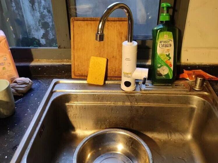 پانسیون Shanghai Hua Xi Shui Xie Guesthouse