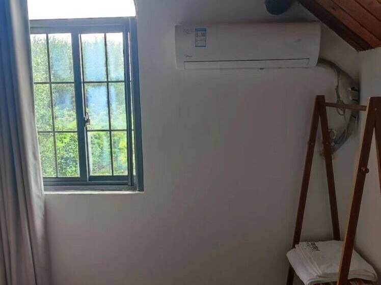 پانسیون Shanghai Hua Xi Shui Xie Guesthouse