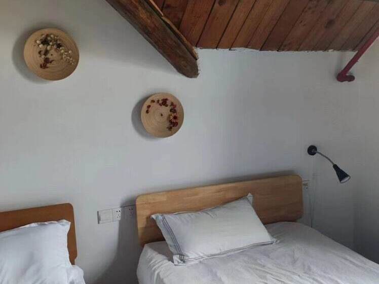 پانسیون Shanghai Hua Xi Shui Xie Guesthouse