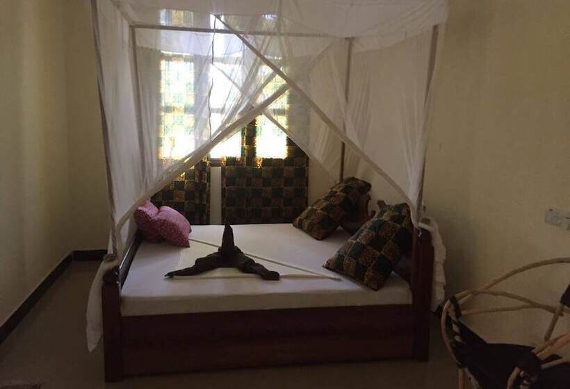 مبيت وإفطار Mpole Bungalows