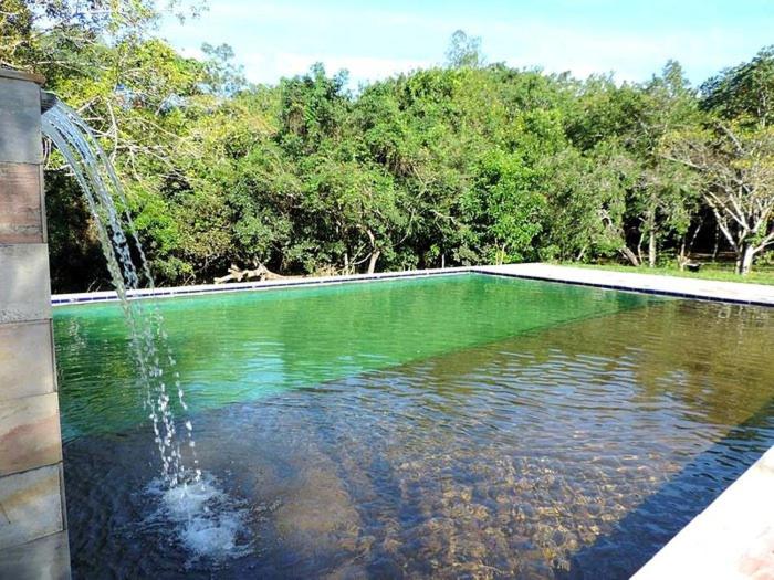ユースホステル Pousada E Camping Claro Casa De Pedra De Delfinópolis  Mg