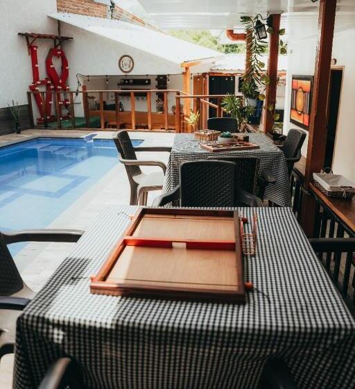 پانسیون Casa Hotel Hostal Del Cafe