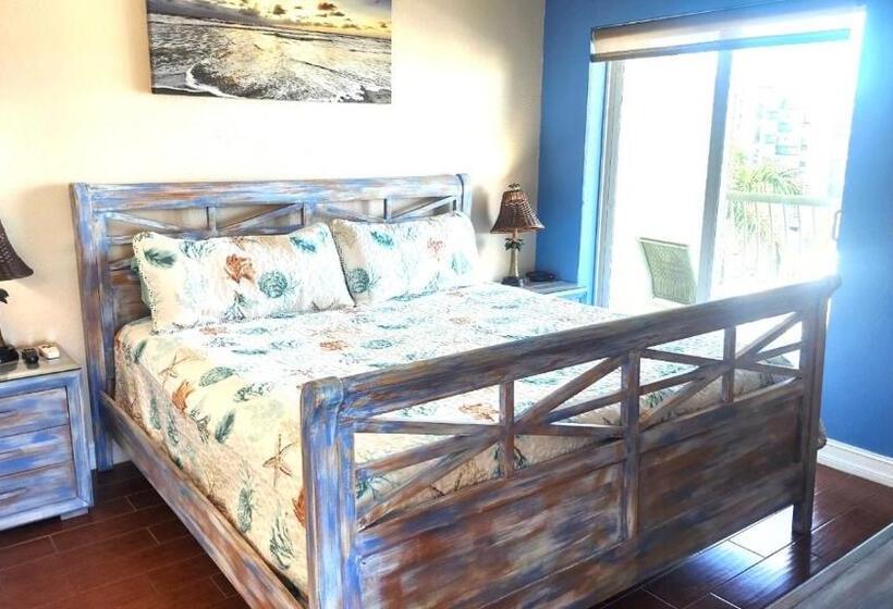 Sunset Sands From Oasis Getaways