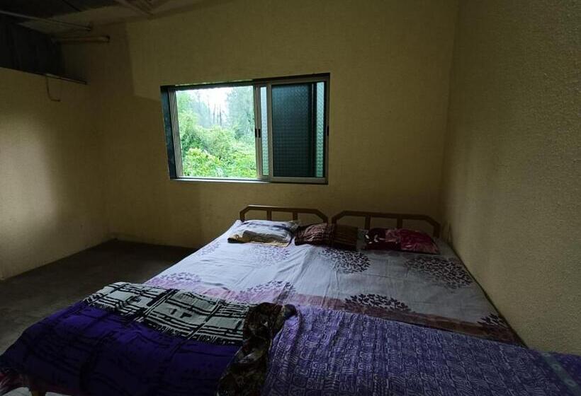 호텔 Datta Srushti Cottage Alibaug