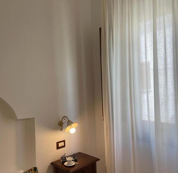 تختخواب و صبحانه Ai Dammusi Rooms