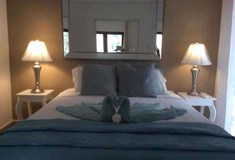 בית מלון כפרי The Beach Club Resort At Caye Caulker
