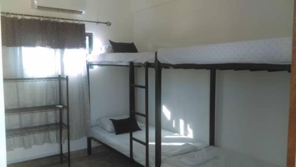 בית מלון כפרי The Beach Club Resort At Caye Caulker