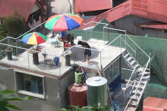 בית מלון כפרי De Hagan Transient Baguio City