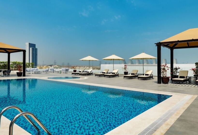 Отель Four Points By Sheraton Production City, Dubai