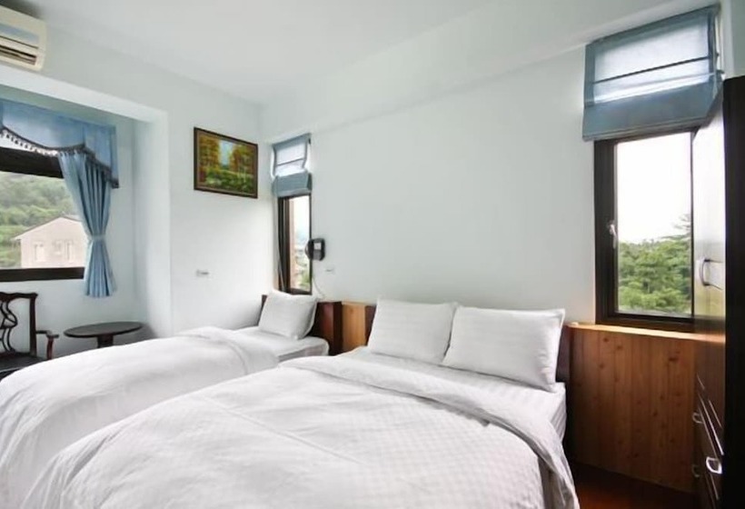 تختخواب و صبحانه Cao Ling Jiao Villa