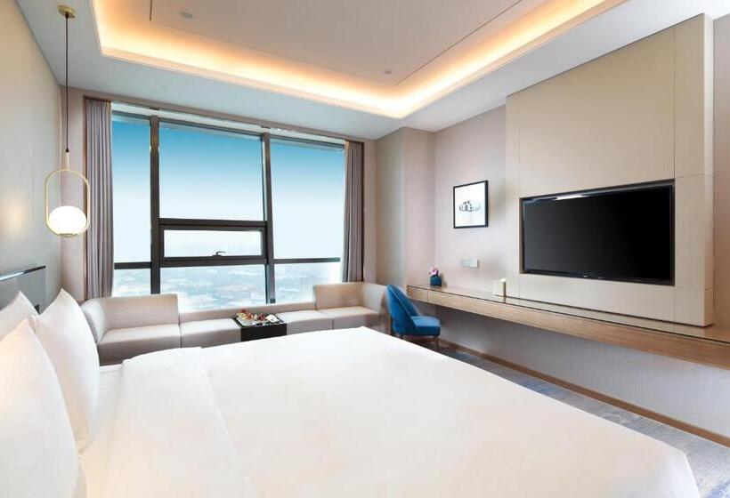 هتل Auto City Ruili