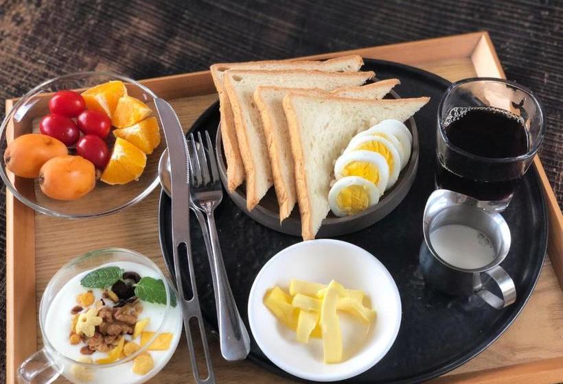 تختخواب و صبحانه Dali Mu Yun Inn