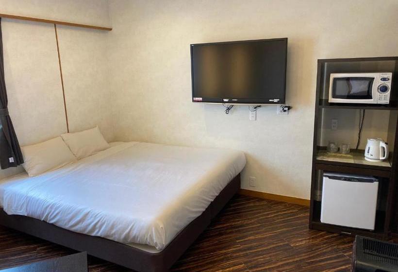 בית מלון כפרי Ginowan Crystal