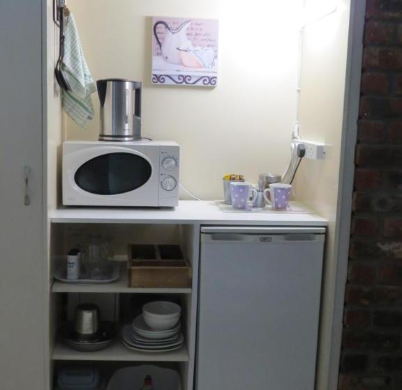 بنسيون Coral Tree Guest Rooms