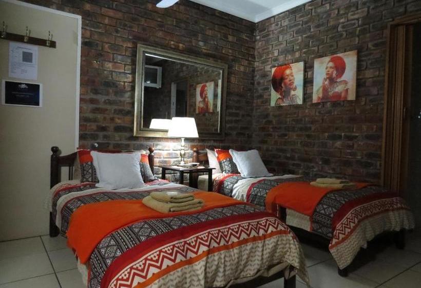 بنسيون Coral Tree Guest Rooms